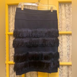 Size 6/8 Eva Franco navy fitted skirt with fringes.